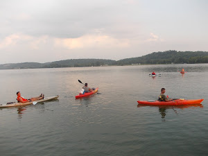 These guys kayak across the Ohio every Wed. evening to FatBoy's; they eat, swim, and just enjoy.