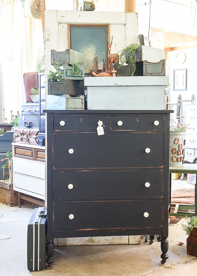 Black painted antique dresser with milk glass knobs
