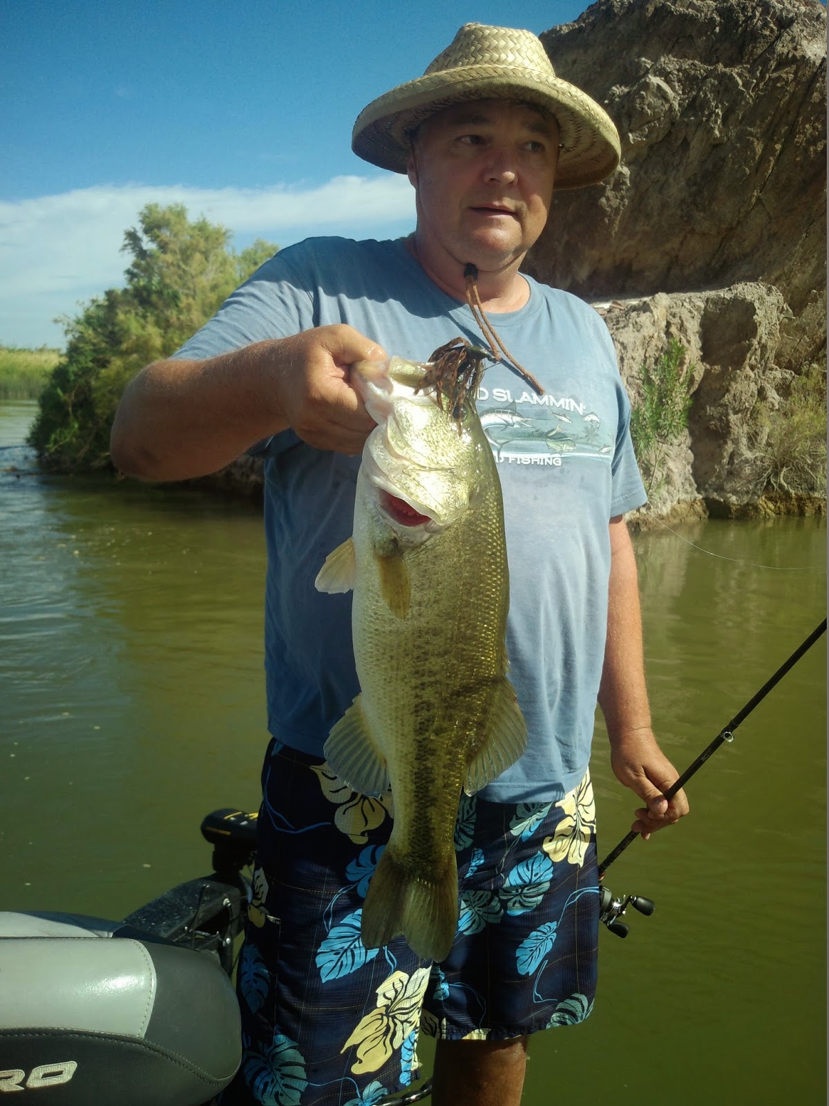 Fishing Safaris Nitro Z7 Bass Boat with a Bimini Top