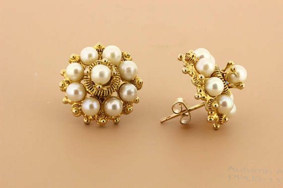 Fancy golden pearl earrings