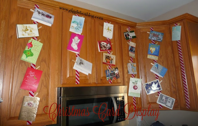 use your Christmas cards as an ever growing Christmas decoration by displaying them in on your kitchen cabinets, Christmas card display,