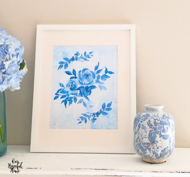 blue floral prints white frame flower vase