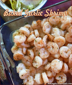 Baked Garlic Shrimp (no butter) is baked in a garlic white wine sauce for a quick and flavorful dinner. | Recipe developed by www.BakingInATornado.com | #recipe #dinner