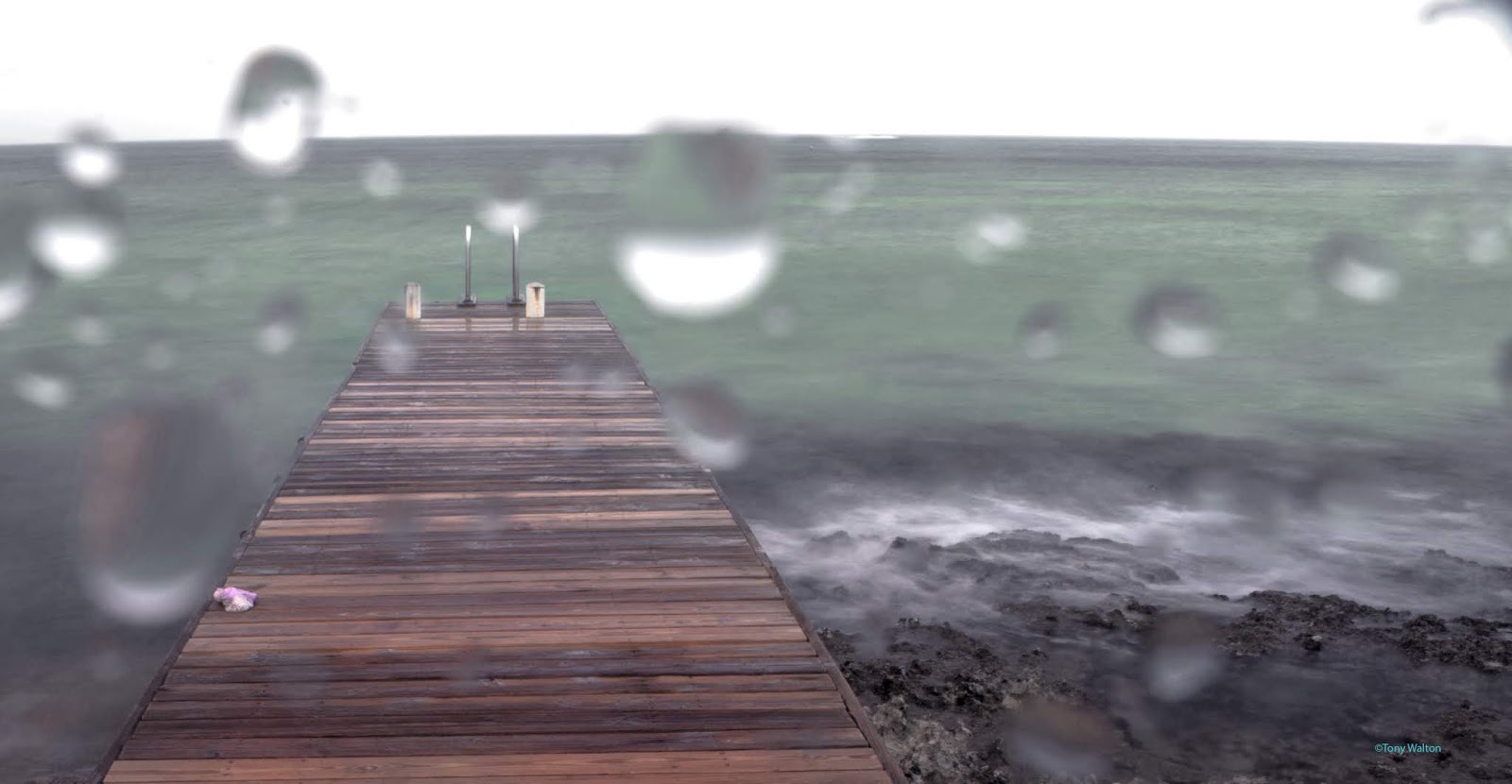 Tony Walton rainy day pier cayman islands