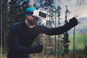 Goofy man in weird outfit and VR headset, out in nature, stop playing video games