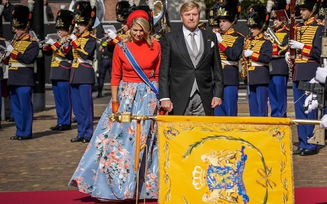 Queen Maxima's outfit is by Belgian fashion house Natan. Princess Laurentien's outfit is by fashion house Hardies in The Hague