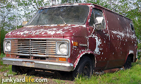 Peeling paint, flat tires do not help the resale value of a vintage 1970s van.