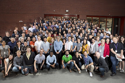 Image of a large group of colleagues at Mila Institute