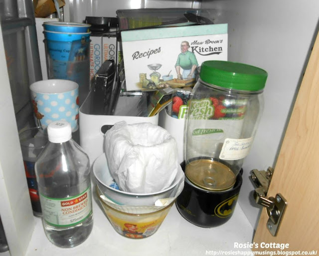 Kitchen Cabinet Re-Organisation: What a mess! Time to get to work.. first I had to empty everything out.