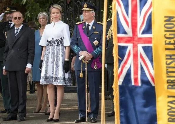 King Philippe and Queen Mathilde met with Queen Elizabeth II at Windsor Castle.Belgian Remembrance Parade. Queen wore Natan dress