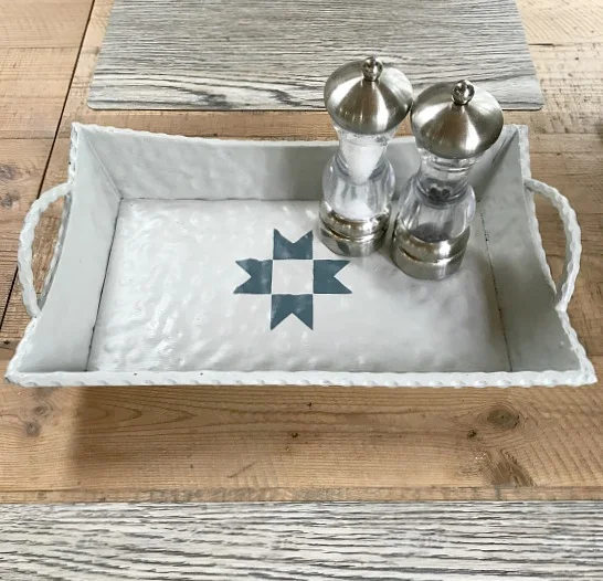 metal tray with stenciled blue quilt design