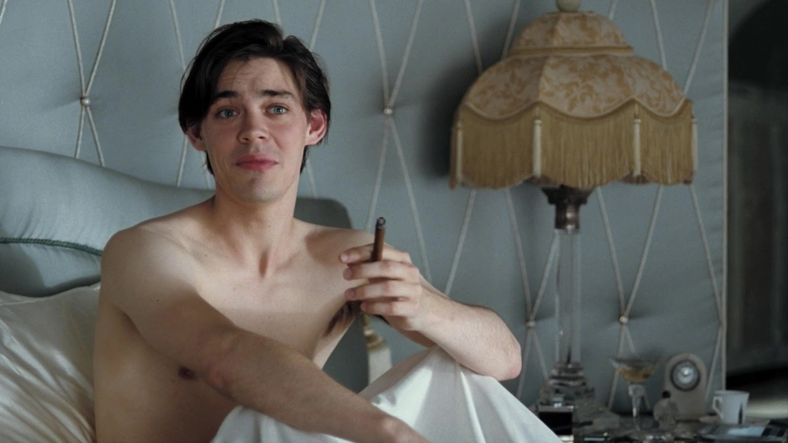 Tom Payne nude in Miss Pettigrew Lives For A Day.