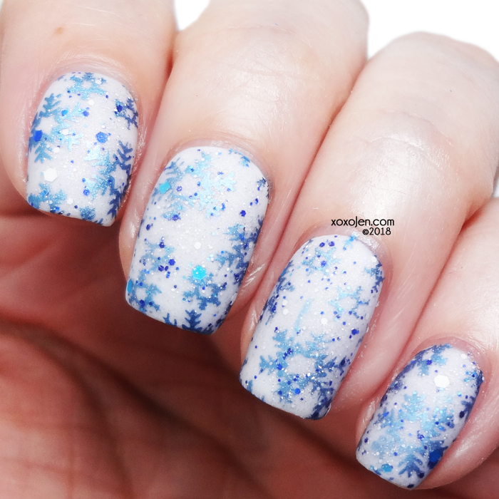xoxoJen's swatch of Twisting Nether stamping nailart