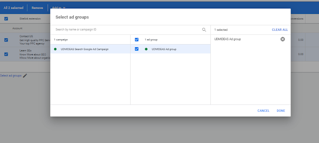 add site extensions to udmideas Google ad group