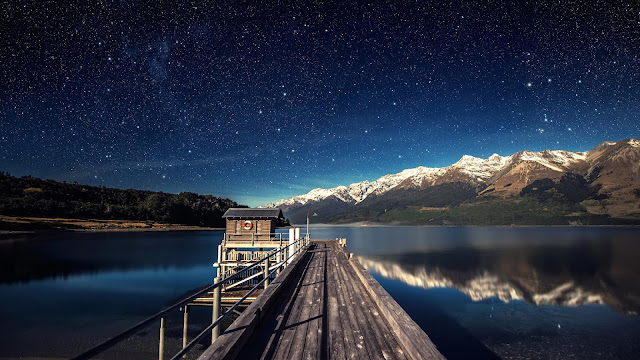 Pier, lake, mountain, night sky, stars wallpaper