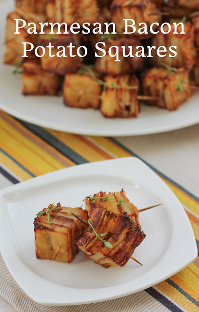 Food Lust People Love:Parmesan Bacon Potato Squares are a tasty appetizer (or side dish) of thinly sliced potatoes layered with bacon, cream and cheese that turn crispy and more-ish when they are baked, cooled then cut into squares and roasted in the oven.