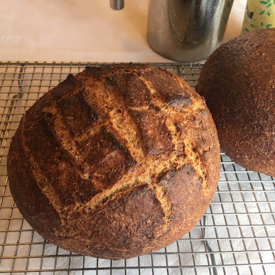 Cob loaf with a criss-cross pattern and excellent crust