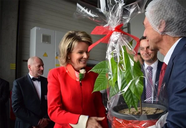 Belvas company is organic chocolate factory in Europe. Queen Mathilde wore Natan red pantsuit and Natan shoes