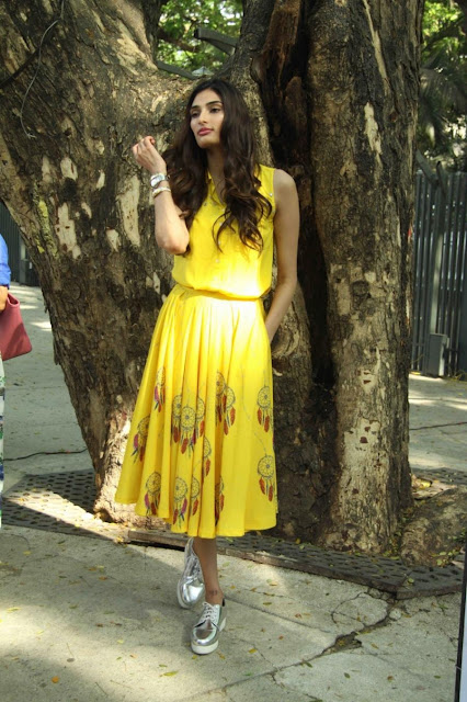 Actress Athiya Shetty Beautiful and Looking Hot in Yellow Dress Navel Queens