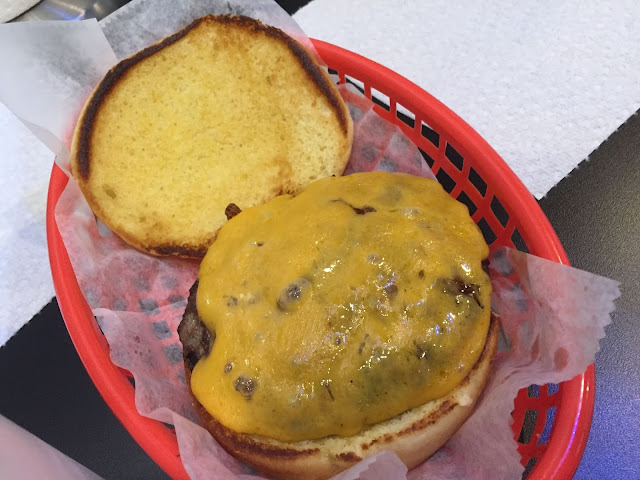 Cheeseburger with cheddar cheese at Rock N Burger