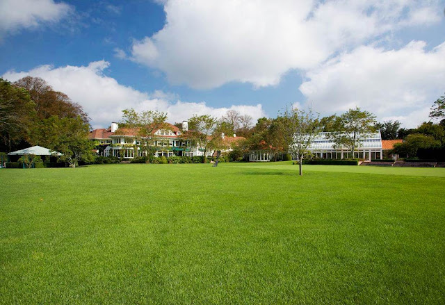 exterior photo of the grounds of a Hamptons mansion