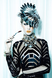 woman eating cockroach, woman eating insects, haute couture, model eating bugs