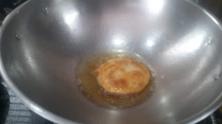 deep fry both sides in oil sweet puri