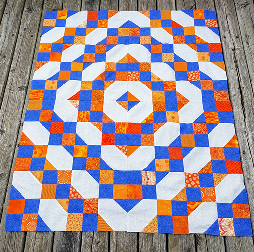 Orange-Blue Fourth of July Quilt designed by Sew Yummy, The Pattern by Bonnie K. Hunter of Quilt Ville