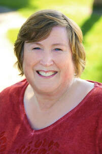 Photo of Anne Pfeffer, author of What We Do for Love. 