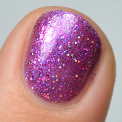 purple jelly nail polish with color shifting flakies and shimmer swatch