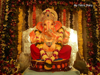 Ganpati pandal with flowers and garlands decoration