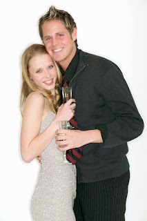 Couple in party attire for a cruise or resort.