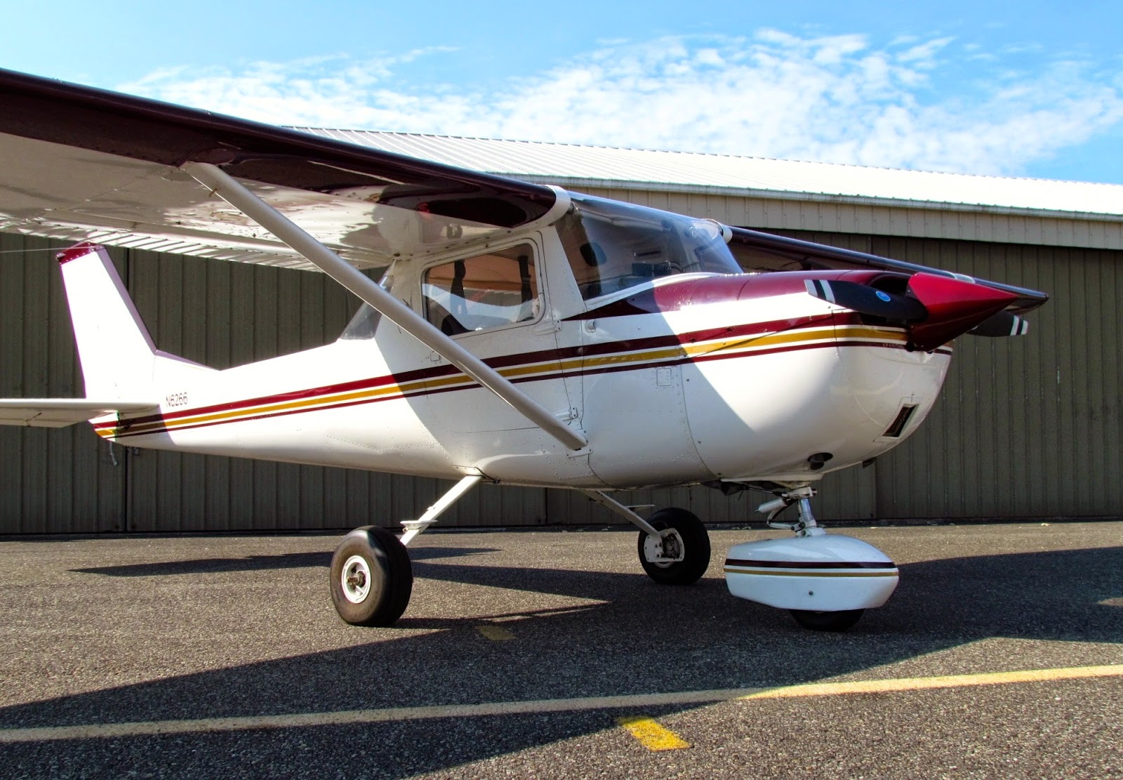 (Minor hangar rash left wingtip; just paint deep, not structural.)