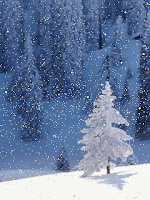 Snow falling on a white tree in a snow-covered field. There is a wooded hillside in the background.