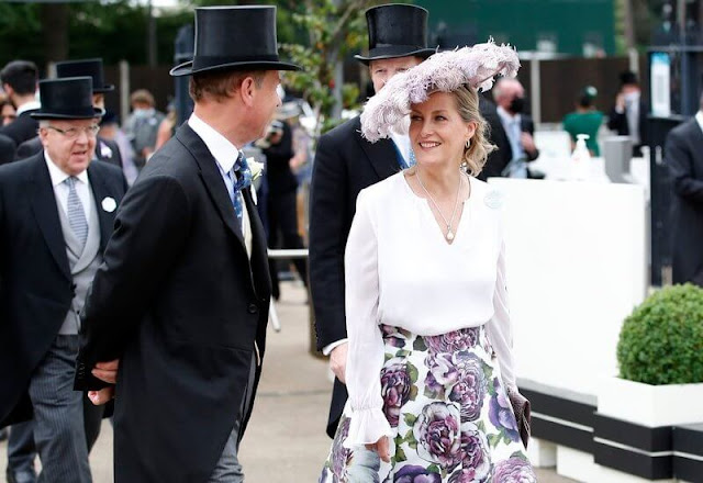 The Countess wore a floral skirt by Suzannah, and white blouse by ARossGirl x Soler. The Duchess wore a chiffon dress by Fiona Clare