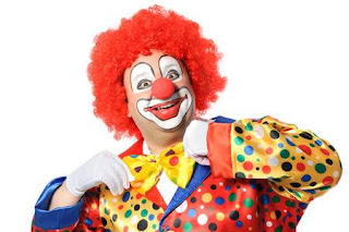 35560690-portrait-of-a-smiling-clown-isolated-on-white