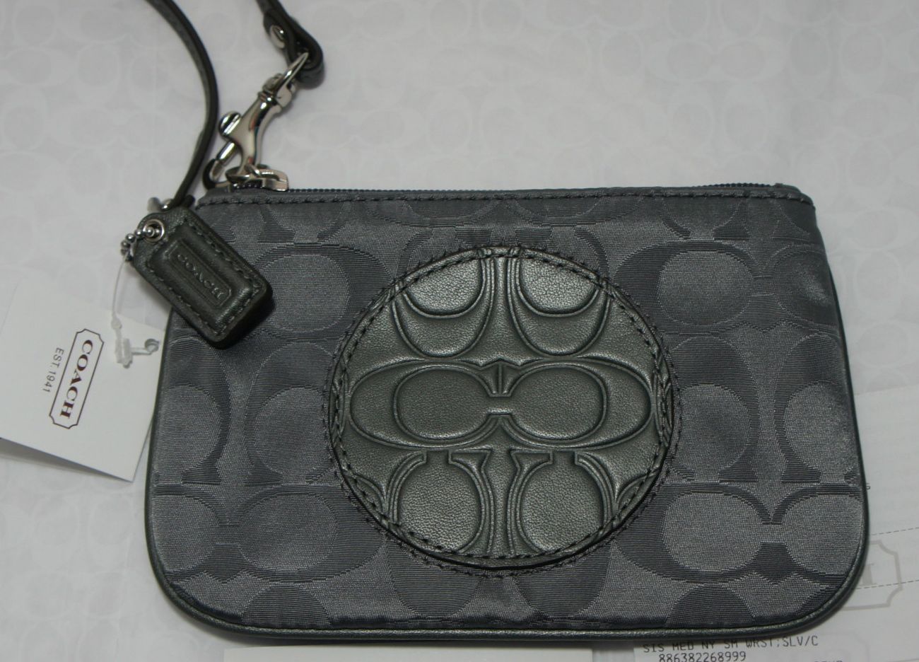 closet&#39;s heaven: COACH Signature Silver Grey (small) Wristlet Purse with Leather Medallion