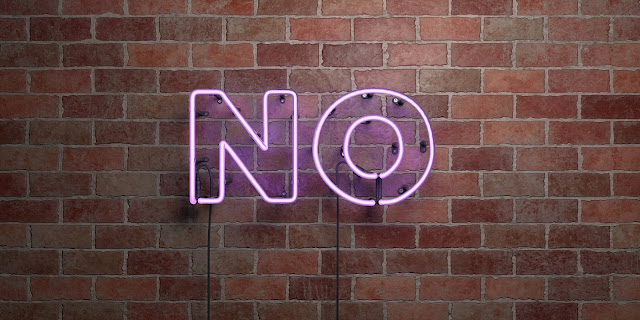 Neon sign that says NO