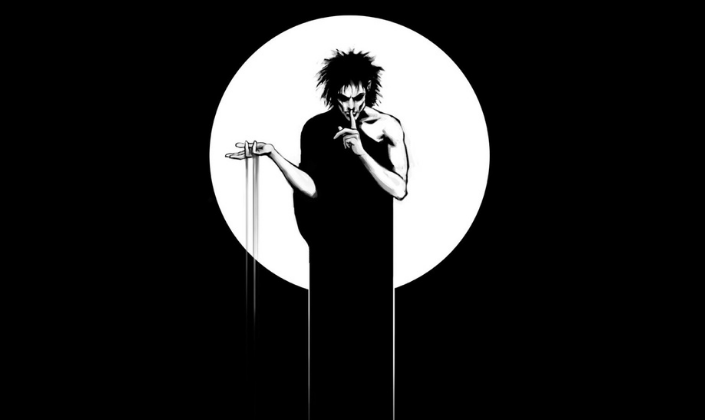 Imagem da capa: fundo preto com a ilustração de Morfeus, uma figura masculina muito pálida, envolta num manto negro e com cabelos negros muito longos e bagunçados, erguendo uma mão com areia escorrendo dela e levando com a outra o dedo aos lábios em sinal de silêncio e um círculo branco por trás.