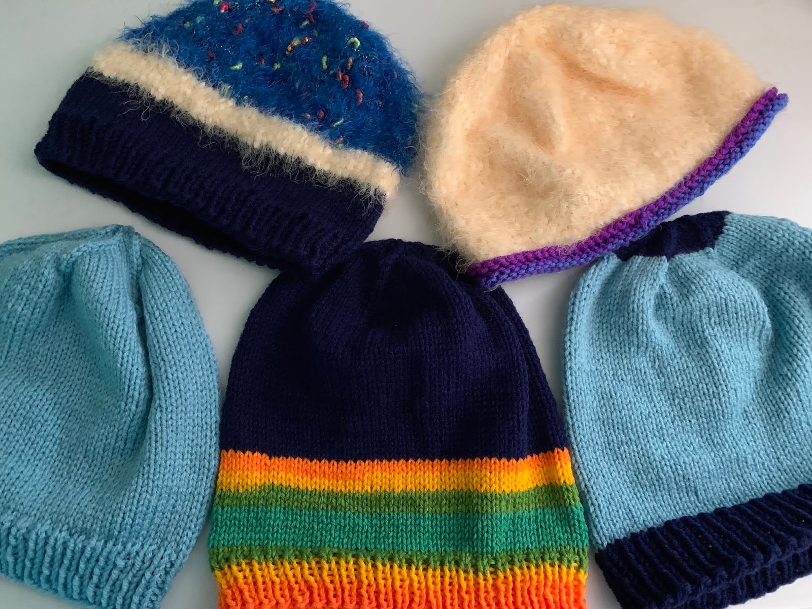 The Zees Go West Knitting Hats for the Homeless