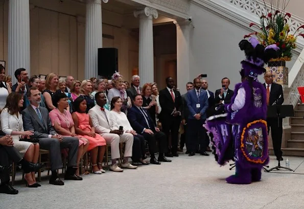 Queen Letizia wore Felipe Varela white dress and Magrit pumps at the Mardi Gras Indians show at New Orleans Museum of Art in City Park