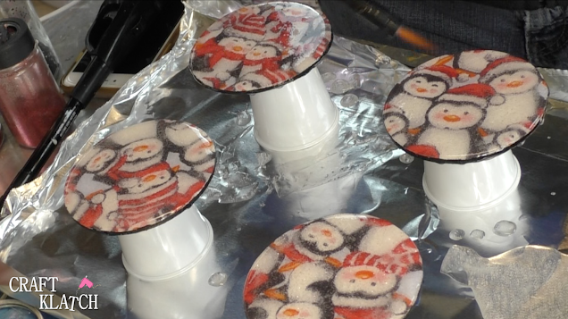 Learn how to make penguin fabric coasters! It's a great Christmas craft idea and beautiful home decor for the holidays! #craftklatch #craftideas #christmas #christmascraftideas #crafts #christmascrafts #howto #diy #penguins #resin #resincrafts #resincoasters #resindiys