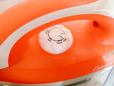 pengatur suhu untuk berbagai jenis pakaian pada setrika