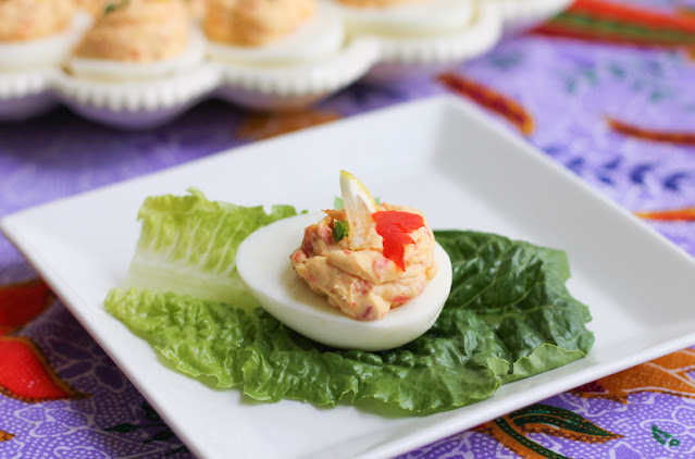 Food Lust People Love: Salty and full of flavor, smoked wild salmon is an excellent addition to stuffed deviled eggs, especially with cream cheese and chives. Serve them at your next party or keep the whole plate for your family!