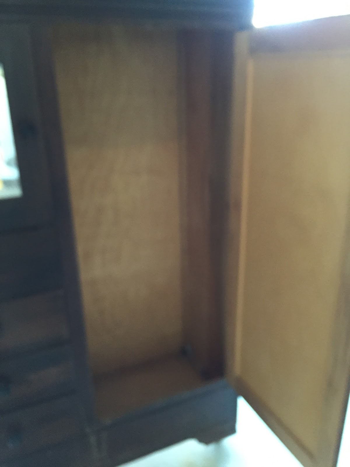 Unfinished interior of 1940s chifferobe Unfinished interior