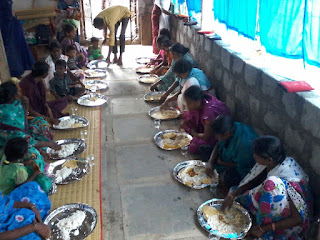 food for widows and orphans in india india orphans and widows beinf fed