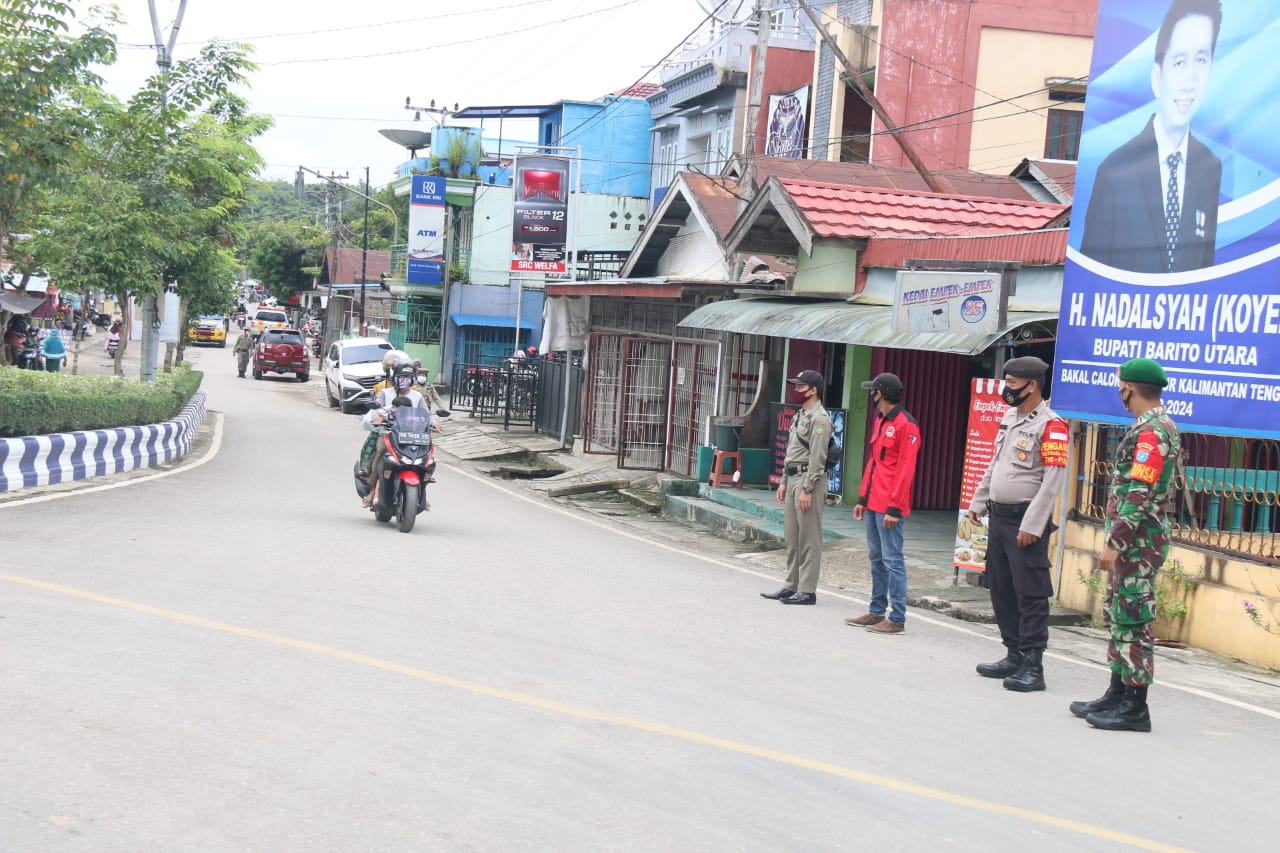 Polres Barito Utara bersama Tim Satgas Covid-19 Laksanakan Pendisiplinan Protokol Kesehatan di Sejumlah Ruas Jalan