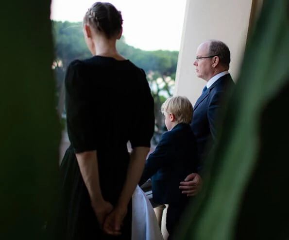 Hereditary Prince Jacques and Princess Gabriella. Princess Charlene wore a new Brunello Cucinelli v-neck midi dress. Louis Vuitton dress