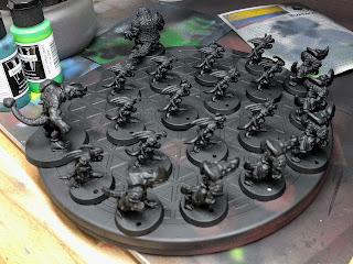 The Turntable made priming easier... but left the deepest recesses showing metal still. Lizardmen team primed black