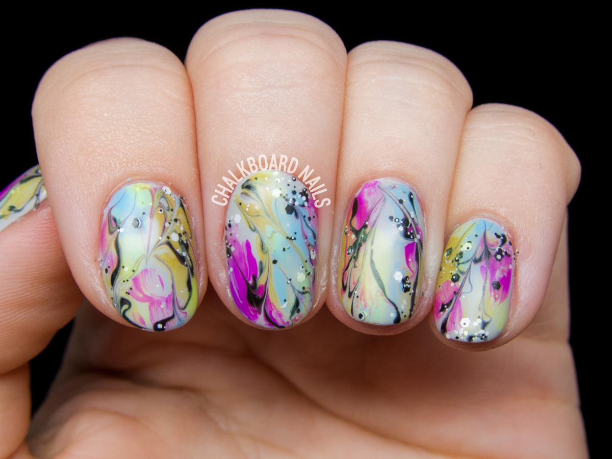 Watercolor marbled nails by @chalkboardnails